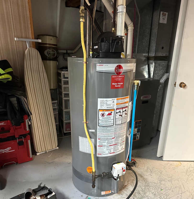 Professional plumber checking a boiler and pipes, boiler service concept.